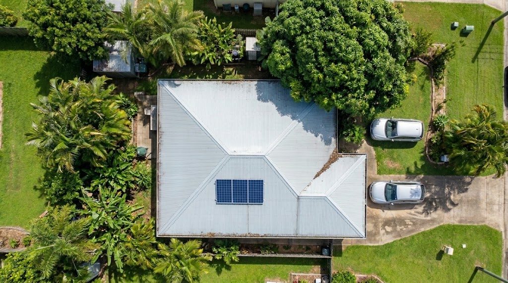 Top-down drone view of a metal roof on a tropical Cairns-style house